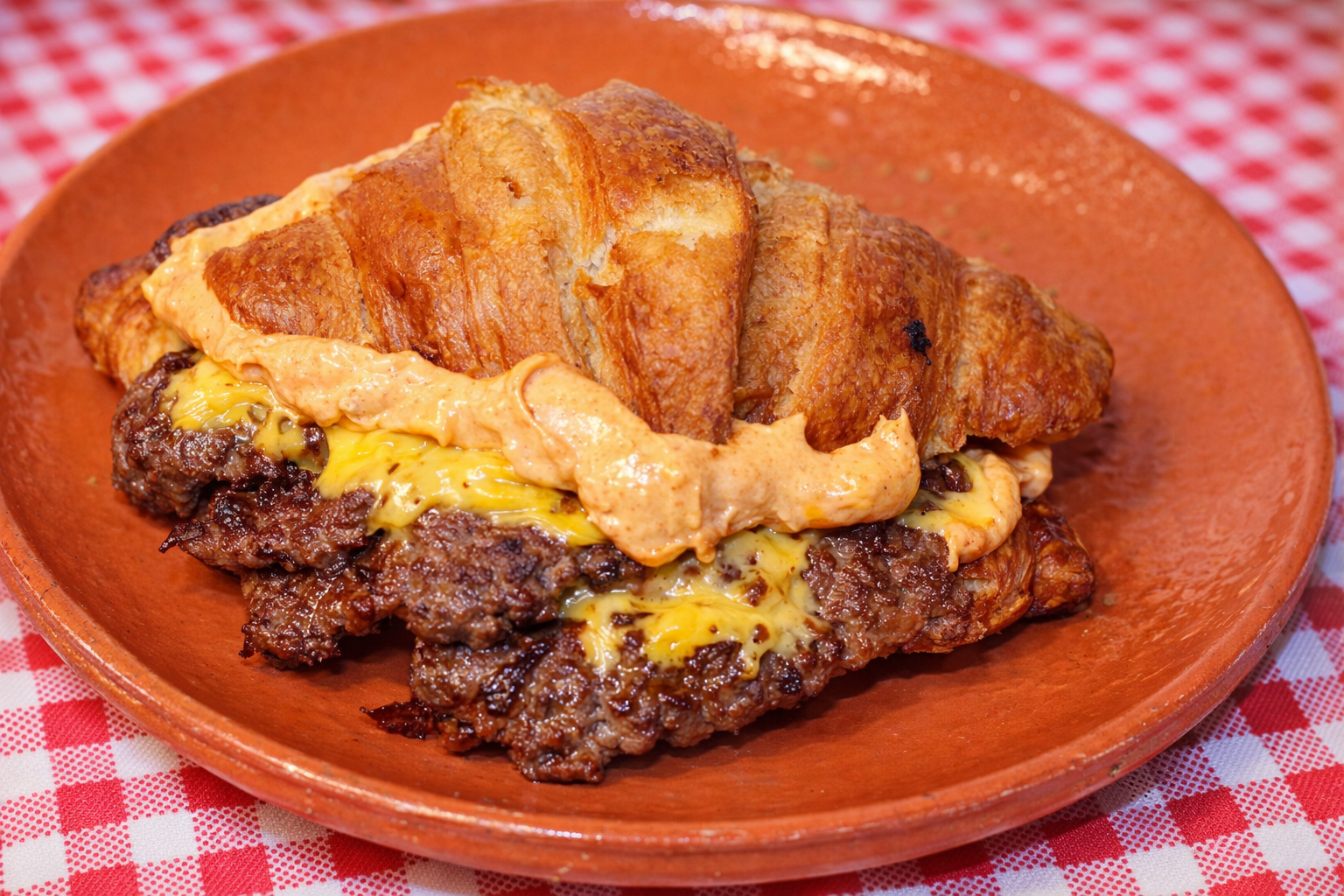 Croissant beef smash burger